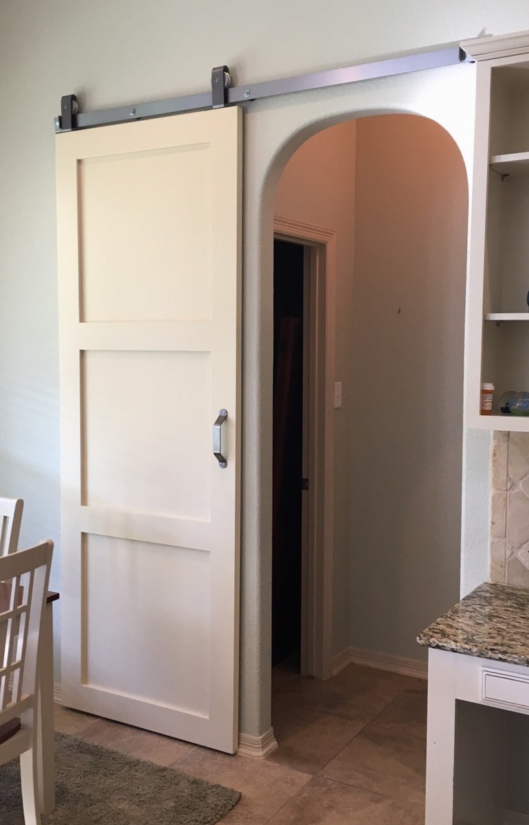 Quaker style barn door in Cincinnati kitchen.